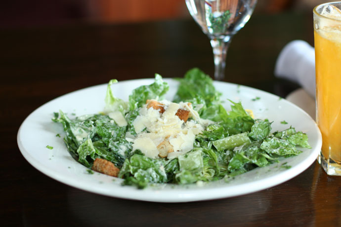 Caesar salad at the Keg Steakhouse on Granville Island in Vancouver BC Canada.