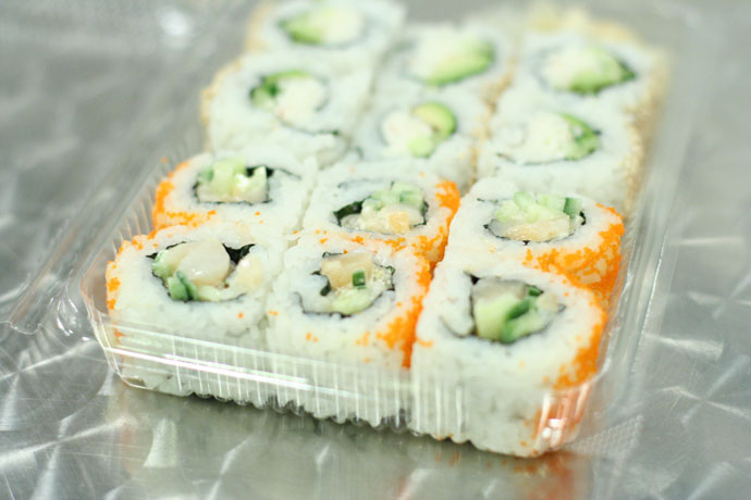 Chopped scallop roll and California roll sushi