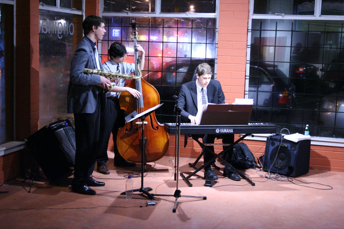 Evan Arntzen, Jason Cho, and Geoff Peters playing jazz