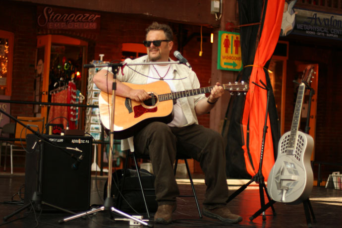 Bill Johnson, blues guitarist, performing at Market Square in Victoria