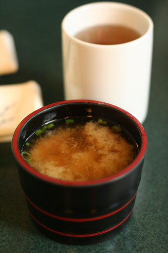 Miso soup ($1.00) and Green Tea (included with meal) from Mr. Sushi Japanese Restaurant in Vancouver, BC, Canada.