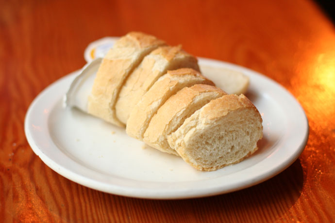 Fresh baguette (French bread) included with the meal at Salade de Fruits French restaurant in Vancouver