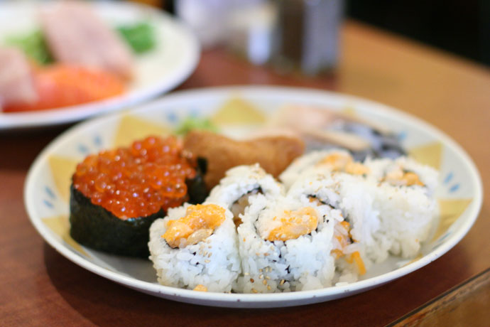 Ikura sushi ($1.95 each) and chopped scallop roll ($3.90)