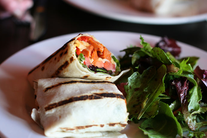 Chorizo sausage wrap and organic salad