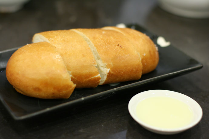 Deep fried bread served with condensed milk
