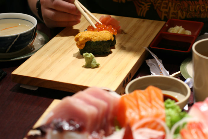 Uni sushi (sea urchin, $2.50), Ikura sushi (salmon roe, $1.80), Sashimi ($13.95) from Sushi Town restaurant in Burnaby, BC, Canada.