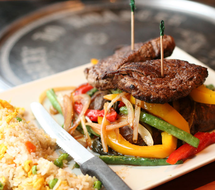 Beef Tenderloin at Wild Ginger (with egg fried rice, potatoes, and stir fried vegetables, around $18)