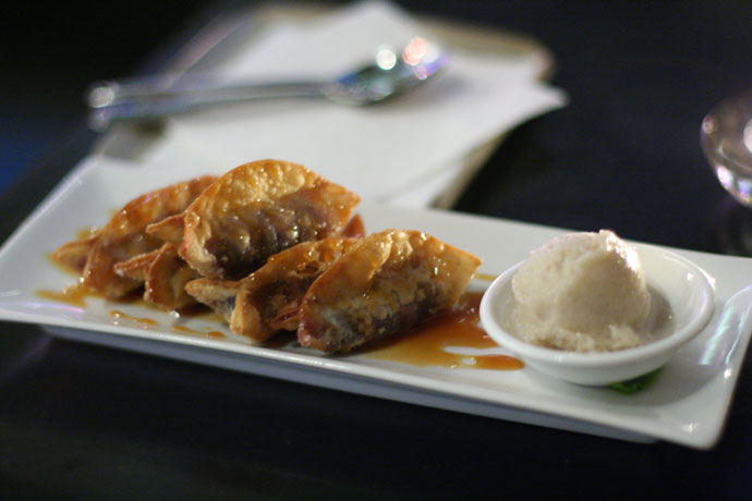 Local fruit dumplings (dessert) from Wild Rice restaurant in Vancouver.  Star anise caramel, vanilla doufu â€˜ice creamâ€™. $8. The Caramel sauce was stupendous!