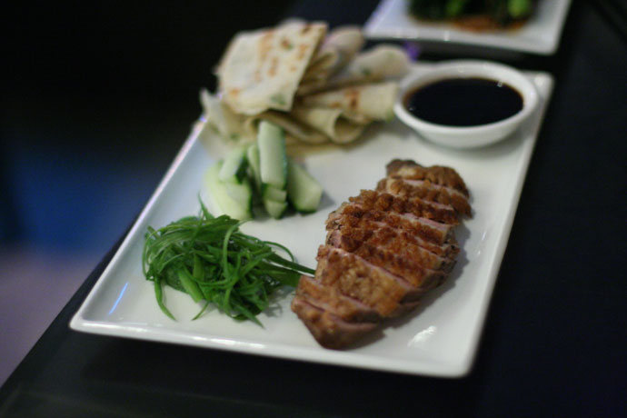 Peking style duck pancakes from Wild Rice restaurant in Vancouver. Made with Yarrow Meadows duck breast, scallion pancakes, and hoisin $18