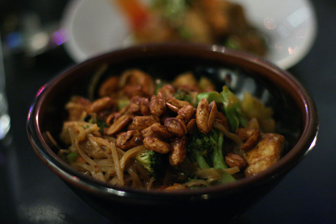 Spicy kung po chicken with twice cooked peanuts from Wild Rice restaurant in Vancouver. Made with Maple Hill free range chicken, broccoli, and rice noodles $18