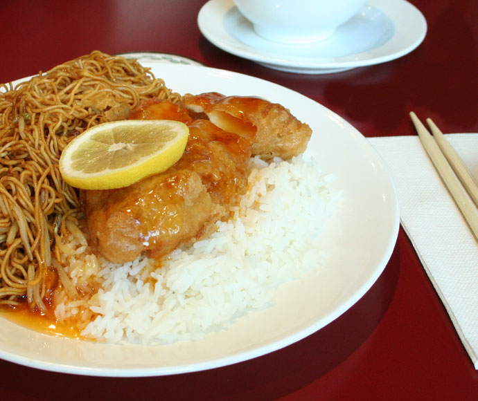 Chinese food: shredded pork chow mein and lemon chicken on rice